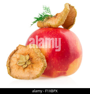 Dried apples and fresh apples on white background. Stock Photo