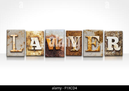 The word 'LAWYER' written in rusty metal letterpress type isolated on a white background. Stock Photo