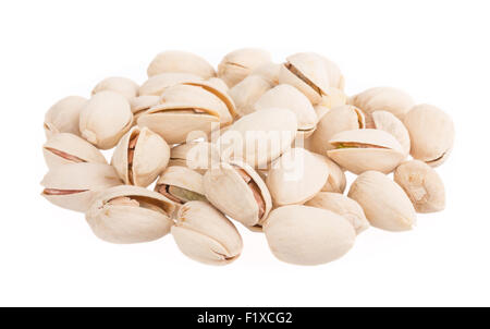 Heap of pistachios nuts isolated on the white Stock Photo