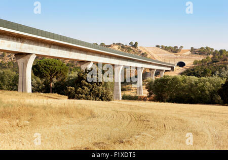 Railway bridge and tunnel under construction in a countryside Stock Photo