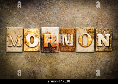 The word 'MORMON' written in rusty metal letterpress type on an old aged leather background. Stock Photo