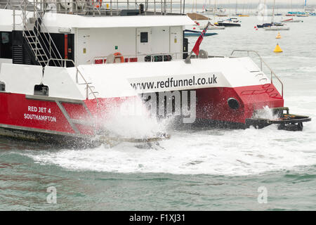 The Red Funnel Ferry or hydrofoil at Cowes on a route between the Isle of Wight and the UK mainland Stock Photo