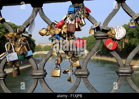 Love lock attached on the Sant'Angelo bridge over the Tiber. Rome, Italy. Stock Photo