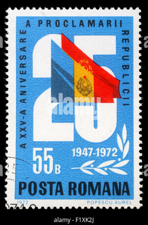 Stamp printed by Romania, shows 25 and flags, 25 anniversary of the republic issue, circa 1972 Stock Photo
