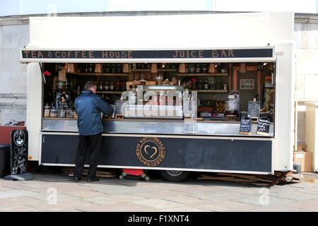 A man being served at a coffee stop on the south bank in london. The coffee house is a recommended coffee shop in London Stock Photo