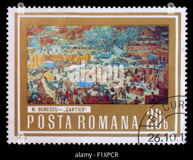 Stamp printed in Romania, shows picture Construction Area by M. Bunescu, from the series Paintings showing Workers, circa 1973 Stock Photo