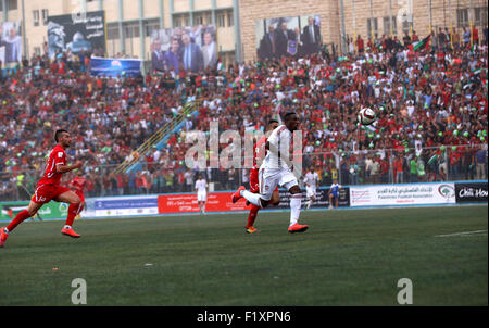 Sept. 8, 2015 - Al-Ram, West Bank, Palestinian Territory - Palestinian players vies for the ball with UAE players during their 2018 FIFA World Cup qualifying football match between Palestine and UAE, at the Faisal al-Husseini Stadium, on September 8, 2015 in the West Bank town of Al-Ram © Shadi Hatem/APA Images/ZUMA Wire/Alamy Live News Stock Photo