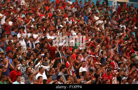 Sept. 8, 2015 - Al-Ram, West Bank, Palestinian Territory - Palestinian fans cheer during the 2018 FIFA World Cup qualifying football match between Palestine and UAE, at the Faisal al-Husseini Stadium, on September 8, 2015 in the West Bank town of Al-Ram © Shadi Hatem/APA Images/ZUMA Wire/Alamy Live News Stock Photo