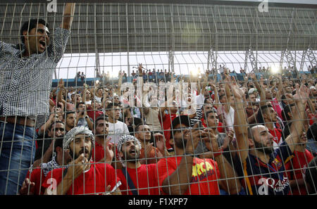 Sept. 8, 2015 - Al-Ram, West Bank, Palestinian Territory - Palestinian fans cheer during the 2018 FIFA World Cup qualifying football match between Palestine and UAE, at the Faisal al-Husseini Stadium, on September 8, 2015 in the West Bank town of Al-Ram © Shadi Hatem/APA Images/ZUMA Wire/Alamy Live News Stock Photo