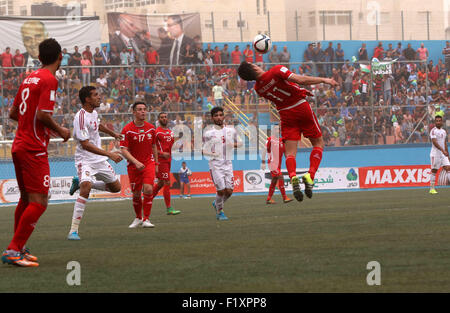 Sept. 8, 2015 - Al-Ram, West Bank, Palestinian Territory - Palestinian players vies for the ball with UAE players during their 2018 FIFA World Cup qualifying football match between Palestine and UAE, at the Faisal al-Husseini Stadium, on September 8, 2015 in the West Bank town of Al-Ram © Shadi Hatem/APA Images/ZUMA Wire/Alamy Live News Stock Photo