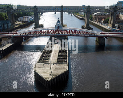 the swing bridge over the river Tyne Newcastle upon Tyne England with the High Level bridge in the background Stock Photo