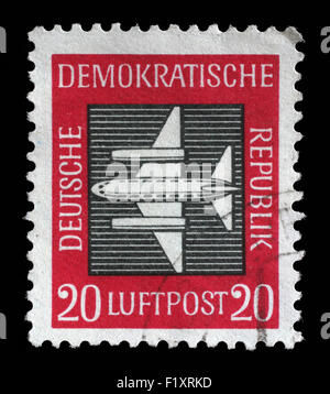 Stamp printed in GDR (East Germany) shows a airplane with the inscription Airmail from the series Airmail , circa 1957 Stock Photo