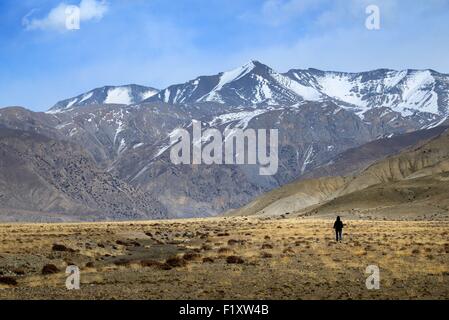Nepal, Gandaki zone, Upper Mustang (near the border with Tibet), trekker near Yara Stock Photo
