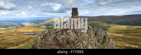 Summer, Summit cairn and OS Trig Point on Place Fell, Hartsop, Lake District National Park, Cumbria County, England, UK. Stock Photo