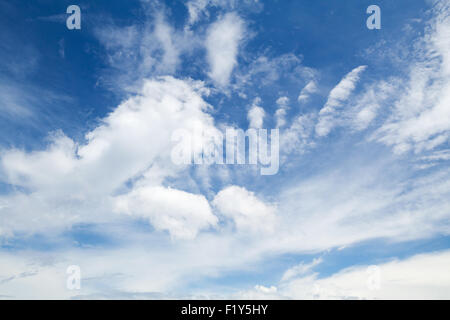 Cirrus, cumulus and altocumulus. Blue sky with different types of clouds, natural background photo Stock Photo