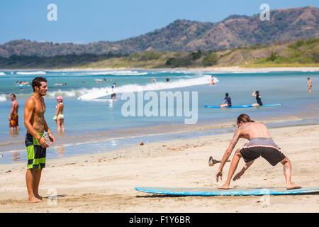 Costa Rica, Guanacaste province, Nicoya Peninsula, Tamarindo Beach, surfer courses Stock Photo