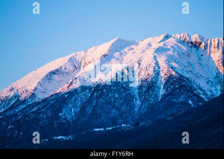 Switzerland, Ticino, ski sunrise on Gridone (2150 m) above Lake Maggiore Stock Photo