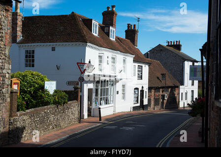 The High Street of the village of Alfriston in the South Downs National Park on a summer afternoon, East Sussex, UK Stock Photo