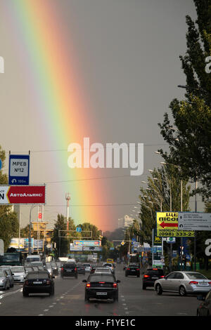 Kiev, Ukraine. 8th September, 2015. Huge rainbows ascended over Kiev this week as cease fire comes to war torn Eastern areas of Ukraine. After many months of bitter gun fire in the East of Ukraine and last weeks fights near the Verkhovna Rada (Parliament) in Kiev, where 3 policemen were killed and 120 wounded, silence came to all regions of Ukraine, while rains and rainbows washed and lit Kiev skies.  After hot August and first week of September with temperatures in Kiev reaching 37 degrees Celcius, fresh winds brought clouds, rains and rainbows. Credit:  Dmytro Mossienko/Alamy Live News Stock Photo