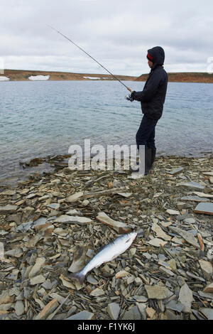 Canada,Fishing,Boy,Nunavut,Arctic Ocean Stock Photo