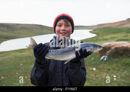 Canada,Boy,Nunavut,Arctic Char Stock Photo