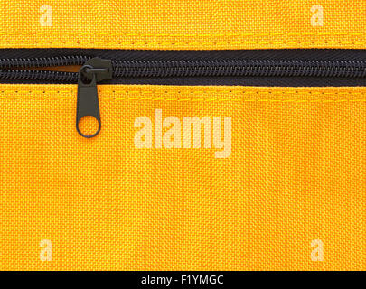 zipper on yellow bag background Stock Photo