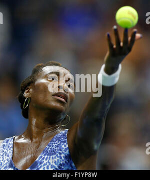 New York, USA. 8th Sep, 2015. Venus Williams of the United States serves during the women's singles quarter-final match against her sister and compatriot Serena Williams at the 2015 US Open in New York, the United States, on Sept. 8, 2015. Venus Williams lost 1-2. Credit:  Qin Lang/Xinhua/Alamy Live News Stock Photo