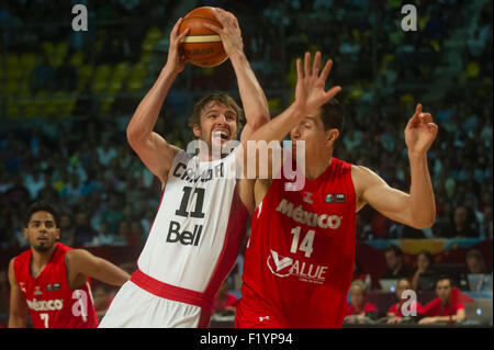 Mexico City, Mexico. 8th Sep, 2015. Mexico's Adrian Zamora (R) vies the ball with Canada's Aaron Doornekamp during the match of the 2015 FIBA America's Championship, in Mexico City, capital of Mexico, on Sept. 8, 2015. Canada won the match. © Oscar Ramirez/Xinhua/Alamy Live News Stock Photo