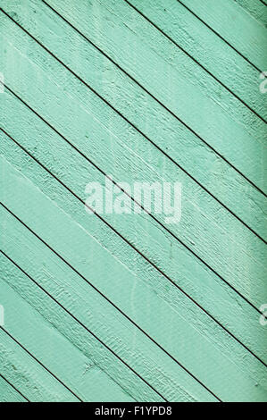 Wooden plank wall painted green, diagonal pattern Stock Photo