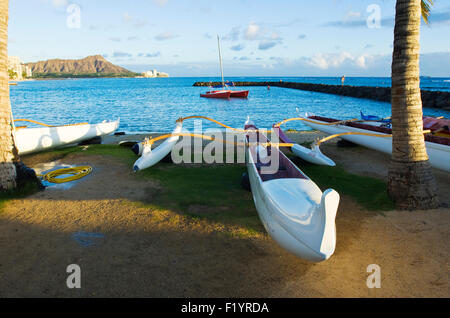 Outrigger canoe on Kahanamoku Beach in Waikiki, Hawaii Stock Photo