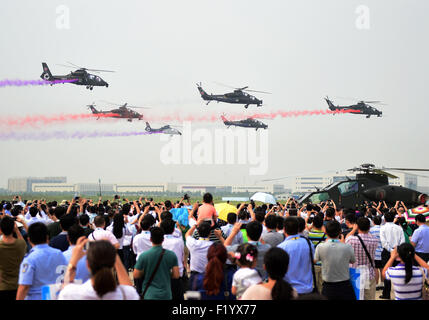 Tianjin, China. 9th Sep, 2015. Gunships perform at the opening ceremony of the Tianjin International Helicopter Exhibition in a helicopter base of Aviation Industry Corporation of China in the Airport Area of China Pilot Free Trade Zone of Tianjin, north China, north China, Sept. 9, 2015. The exhibition displayed 56 helicopters and attracted 366 enterprises. Credit:  Zhang Chenlin/Xinhua/Alamy Live News Stock Photo