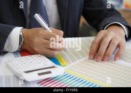 Businessman is analyzing business data Stock Photo
