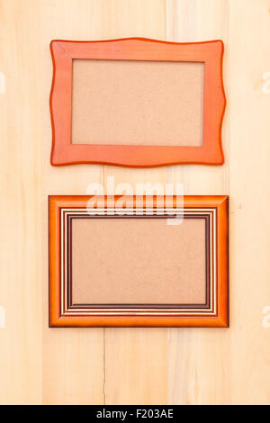 Two Classic wooden frame on wood background Stock Photo