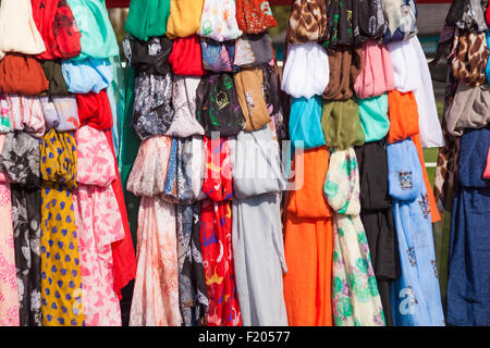 Colourful scarves for sale on stall at Poole Thai Festival, Dorset, UK in September Stock Photo