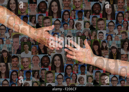 Reaching a helping hand people hands rescue and friends support Stock Photo