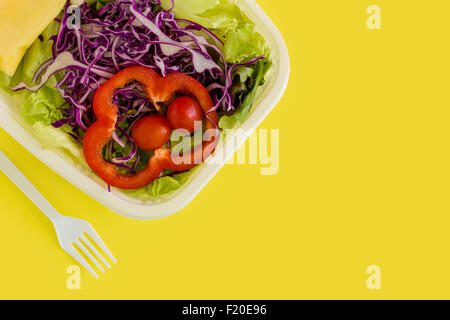 Fresh salad in plastic box ready for takeaway. Stock Photo