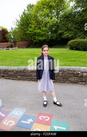 Portrait of girl in school uniform Stock Photo