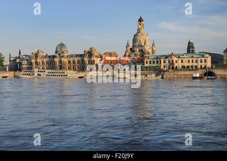Germany Saxony Dresden The city skyline with cruise boats moored on the flooded River Elbe in front of the embankment buildings Stock Photo
