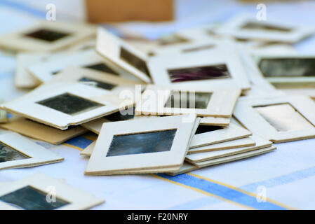 Many old slides on the table in garden Stock Photo
