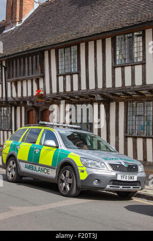 Paramedic vehicle parked outside a timber-framed building, England, UK Stock Photo