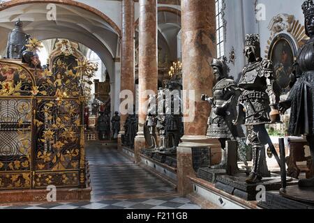 Austria, Tyrol, Innsbruck, Imperial church (Hofkirche), bronze statues (The black men) and Mausoleum of Maximilian I Stock Photo