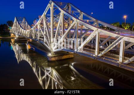 France, Rhone, Lyon, La Confluence district south of the Presqu'ile, closed of the confluence of the Rhone and the Saone rivers, view of the bridges of MulatiΦre over the Saone including the railroad bridge (XXth century) builds by Maurice Koechlin whose Stock Photo