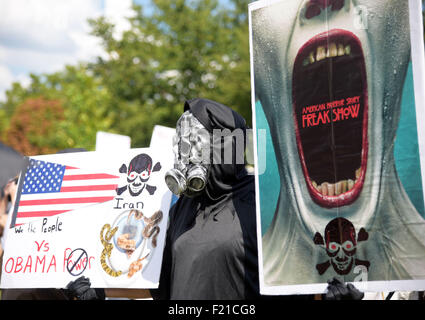 Washington, DC, USA. 9th Sep, 2015. A participate of 'Stop the Iran Deal' rally shows his signs to people in front of Capitol Hill in Washington, DC, capital of the United States, Sept. 9, 2015. U.S. Republican presidential candidates Donald Trump and Ted Cruz called on lawmakers to boycott the Iran nuclear deal Wednesday, warning of dire consequences if the agreement is implemented. Credit:  Bao Dandan/Xinhua/Alamy Live News Stock Photo