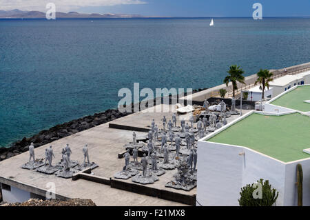 Figures of people made from concrete, Rubicon Marina, Playa Blanca, Lanzarote, Canary Islands, Spain. Stock Photo