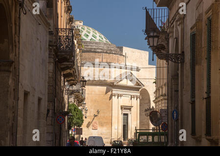 Sunlit back-street in town of Lecce Apulia Italy Stock Photo