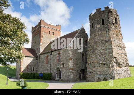 The Roman Pharos and St Mary in Castro Church within the Dover Castle grounds in Kent Stock Photo