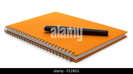 notebook with pen isolated on white background Stock Photo