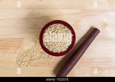 Uncooked Jasmine Brown Rice in Mortar Stock Photo