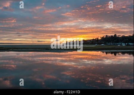Porthmadog, Gwynedd, North Wales, UK. Sunset over Tremadog Bay and the Afon Glaslyn estuary Stock Photo