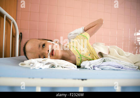 A child with severe hydrocephalus at Peace Village ward at Tudu Hospital in Ho Chi Minh City, VIetnam. Stock Photo